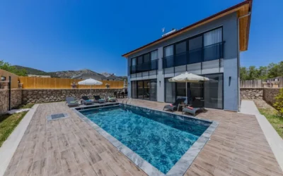 How Do Pool Houses Enhance Outdoor Living Spaces?